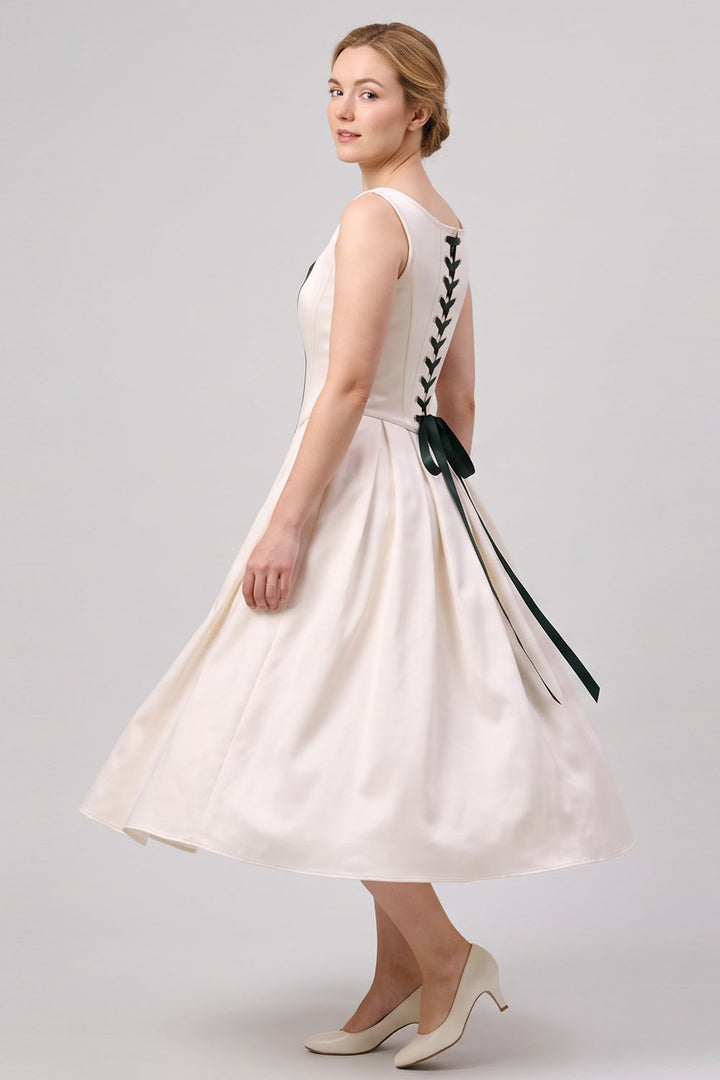 MARLY Rococo Corset Tea Dress in Ivory / Forest Green on model – side view