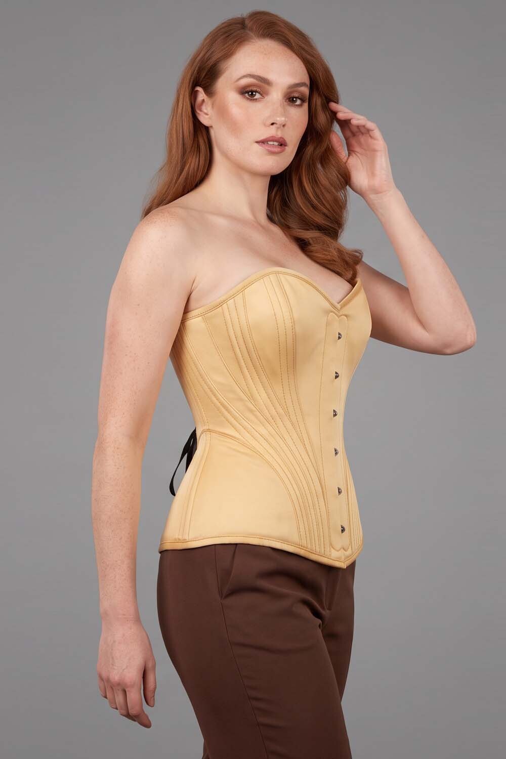 ASTER Overbust Waist-Training Corset in Nude Satin on model – side view