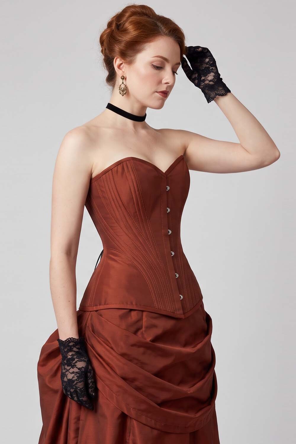 ASTER Overbust Waist-Training Corset in Rust Red Taffeta on model – side view