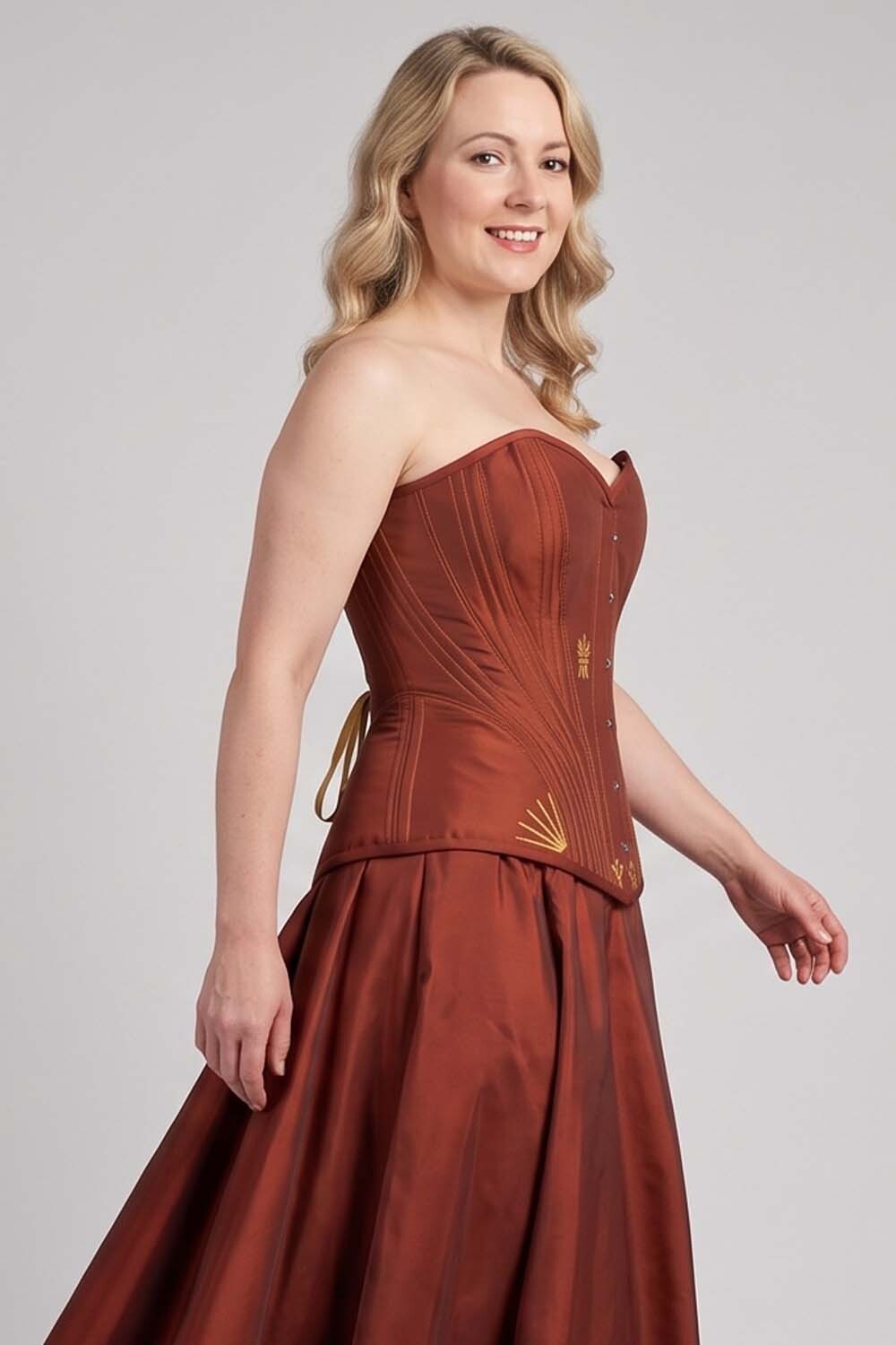 ASTER Overbust Waist-Training Corset in Rust Red Taffeta on model – side view