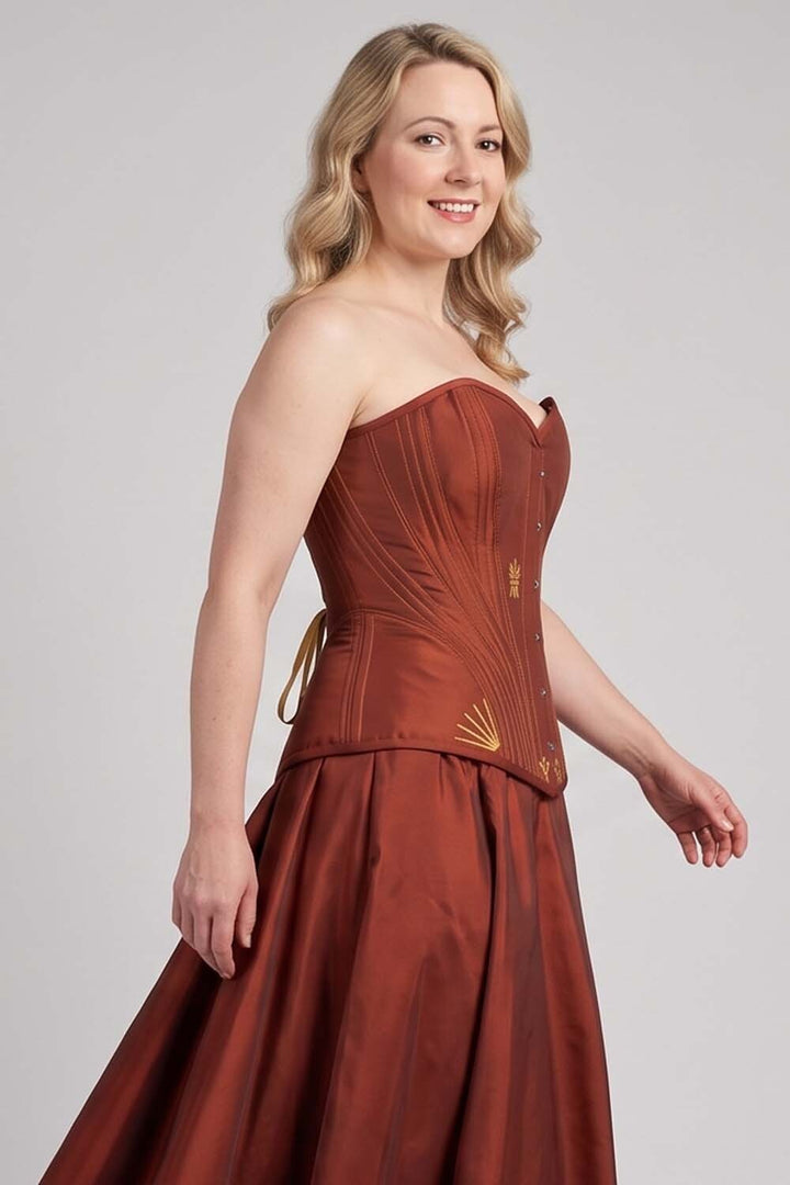ASTER Overbust Waist-Training Corset in Rust Red Taffeta on model – side view