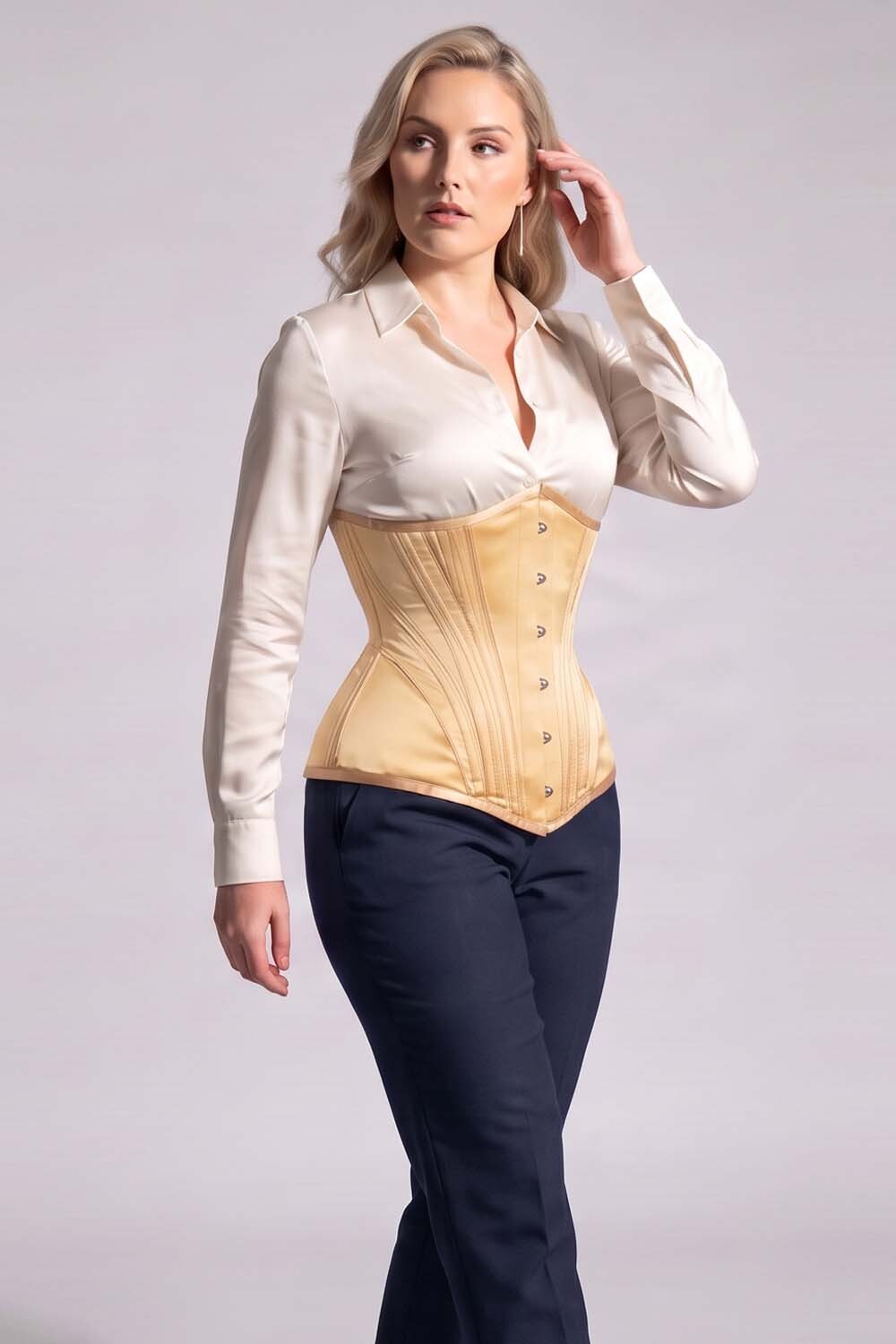 ORCHID Underbust Waist-Training Corset in Nude Satin on model - side view