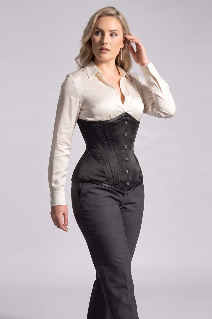 ORCHID Underbust Waist-Training Corset in Black Satin on model - side view